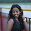 "Vandhana P B standing, smiling, professional portrait for digital marketing profile
